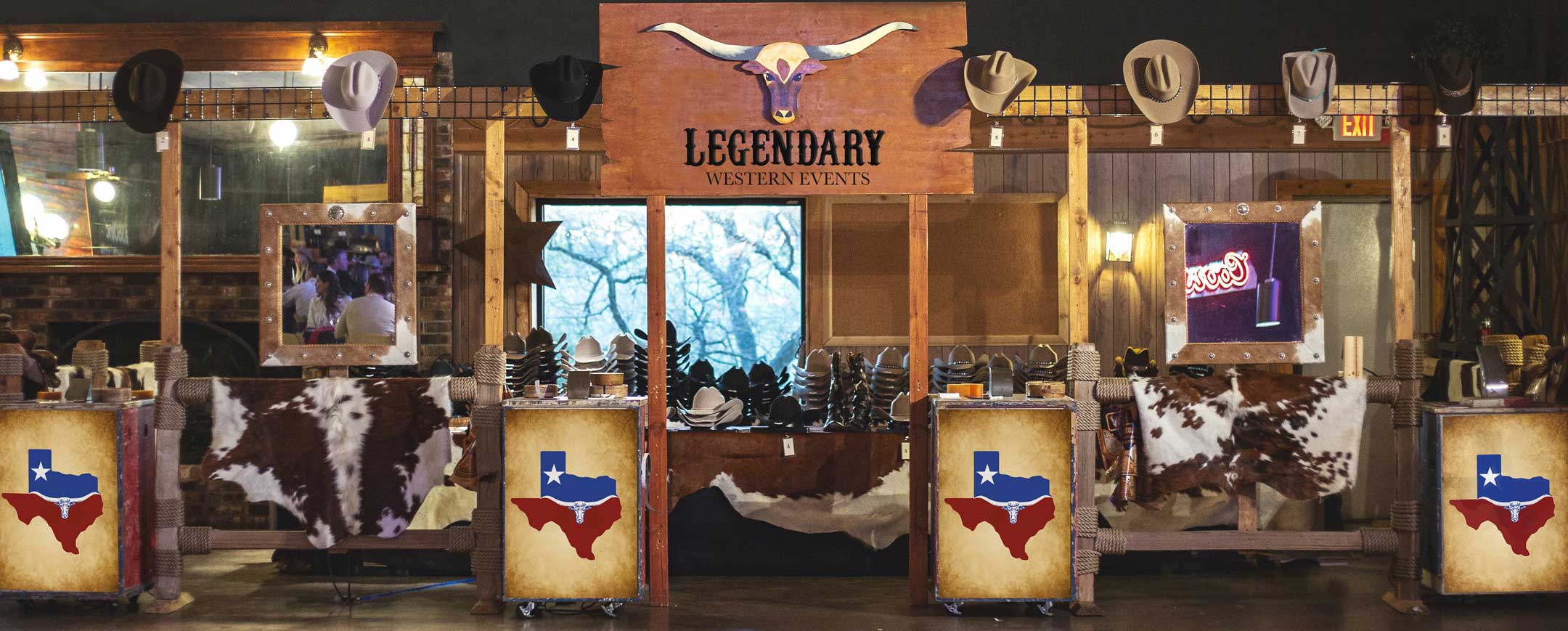 A wooden sign with the words " legendary western events " on it.